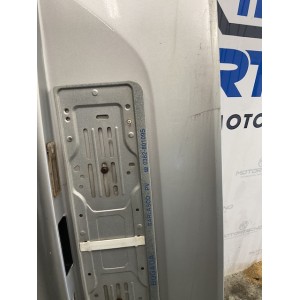 Pannello posteriore portellone grigio smart 451 con segni di usura e una crepa come da foto